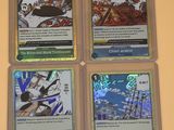 Quatre cartes de jeu sont posées sur une table