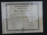 a close up of a paper with a certificate on it