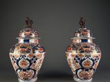pair of large chinese vases with lids decorated with flowers and birds