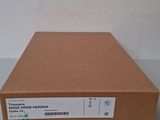 a brown box with a white label sitting on a table