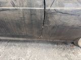 a car that has been damaged and is sitting on the ground
