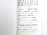 an open book with a picture of a castle on it