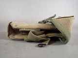 a bag that has a pair of scissors inside of it