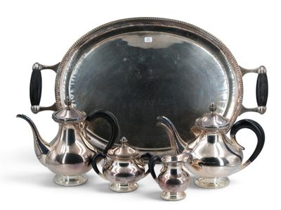 a silver tray with a silver tea set on it