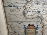 a picture of a picture of a map in a glass case