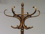 an image of a coat stand with a coat rack on top of it