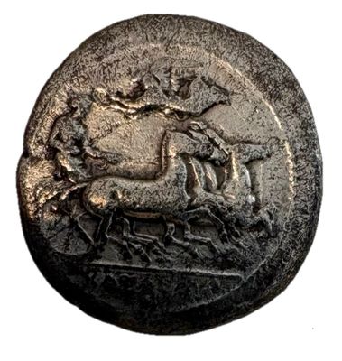 gros plan d'une pièce de monnaie sur laquelle figure un cheval