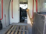 a truck with a pallet in the back of it