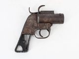 an old gun on a white surface with a white background