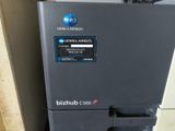 a machine that is sitting on the floor in front of a wall