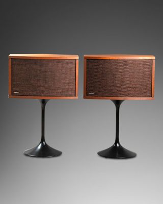 a pair of mid century style table lamps by person