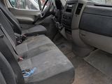 an image of a van with the front seats down