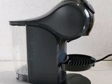 a coffee maker that is sitting on a table