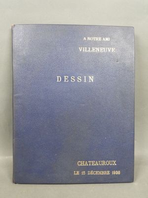 a blue book sitting on top of a table next to a white wall