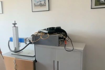 a cabinet with a phone on top of it next to a cabinet with a phone on top of it