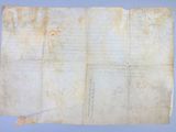 a large piece of parchment with writing on it