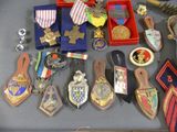 many medals and medals on display on a table