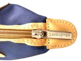 a close up of a purse with a zipper on it