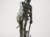a bronze statue of a man holding a spear and a hammer