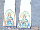 pair of white cloth with a picture of a woman holding a basket of flowers