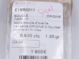 a plastic bag with a label on it on a white surface