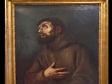 un tableau représentant un homme barbu vêtu d'une robe marron