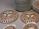 many plates that are sitting on a table