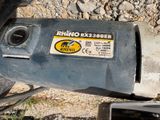 a close up of a drill on the ground