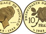 gros plan d'une pièce de monnaie sur laquelle figure un visage de femme