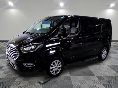 an image of a black van parked in a garage