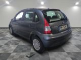 a small car that is parked in the garage