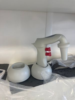 a plastic bag on the counter with a blender and other items