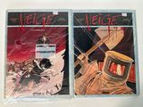 two covers of a comic book are on display on a table