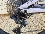 a close up of a bike with a chain on the front wheel