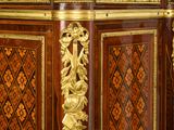 an image of a very ornate cabinet in a room