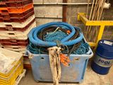 many different types of hoses and other items in the room