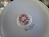 a close up of a white bowl with writing on it