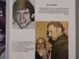 un livre ouvert sur lequel figure l'image d'un homme et d'une femme