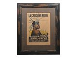 framed picture of a poster of a woman in a headdress