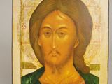 an icon of jesus with long hair and a beard