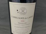 a bottle of wine that is sitting on a table