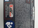 the back of a box with a sticker on it on a white surface