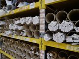 many rolls of toilet paper on the shelves in the store