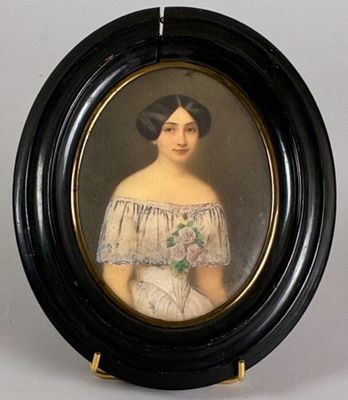 portrait of a woman in a white dress in a black frame