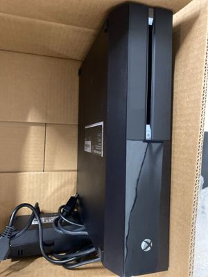 une boîte contenant une console de jeux vidéo