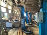 a large machine that is sitting in a warehouse