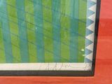 a picture of a painting on the wall of a train