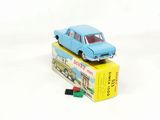 a blue toy car sitting on top of a box