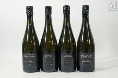 quatre bouteilles de vin sont alignées sur une surface blanche