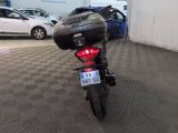 a motorcycle that is parked inside of a building